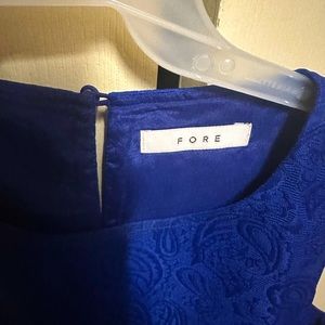 Women’s boutique dress size Med. Bright blue color! And roomy fit!